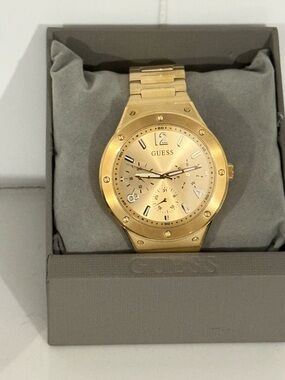 GUESS Men's Multi-Function Gold Tone Case Gold Stainless Steel Bracelet Watch